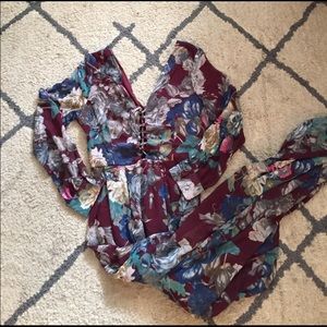 Burgundy floral maxi dress with a tie front.
